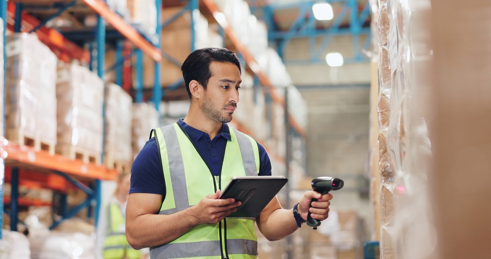 Logistics,,Man,And,Tablet,In,Warehouse,With,Scanning,,Stock,And